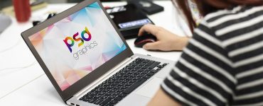 Female Working on Macbook Mockup PSD