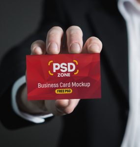 Free Business Card in Hand Mockup PSD
