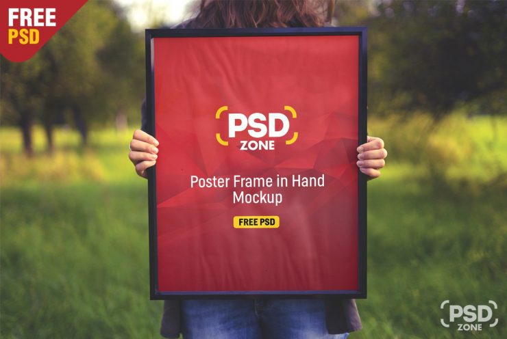 Poster Frame in Hand Mockup PSD