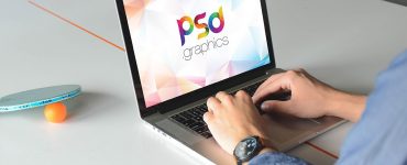 Man Working on Macbook Pro Mockup PSD