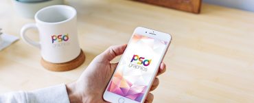 Male Holding iPhone in Hand Mockup