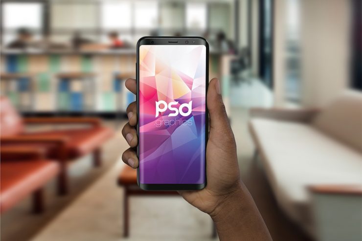 Smartphone in Hand Mockup PSD