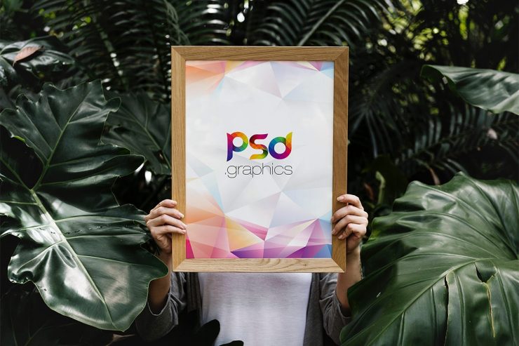 Woman Holding Poster Frame Mockup PSD