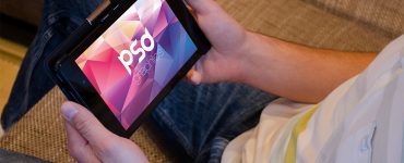 Android Tablet in Hand Mockup PSD