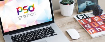 Free Macbook Pro on Table Mockup PSD