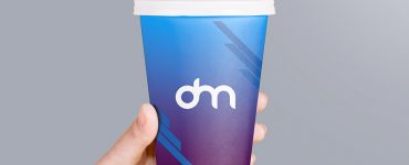 Holding Paper Coffee Cup Packaging Mockup