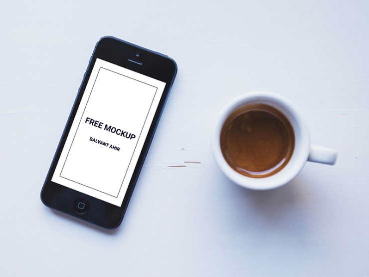 iPhone with Coffee Cup Mockup Free PSD