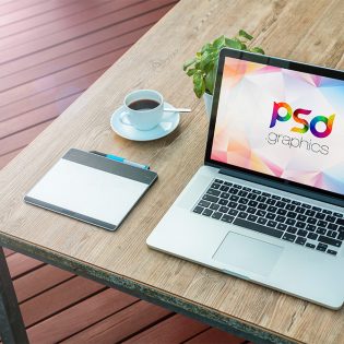 Macbook Pro on Table Mockup Free PSD