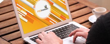 Man Working on Macbook Mockup PSD