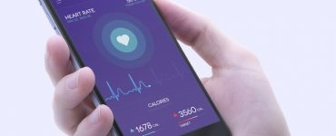 iPhone in Hand Mockup Free PSD