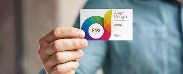 Man Holding Business Card Mockup PSD