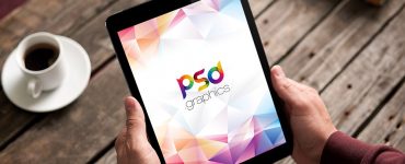iPad in Hand Mockup Free PSD